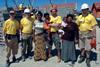 Cape crusader: Tiffney (far right) helped build homes
