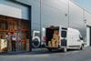 Warehouse with van outside shutterstock_2042952242 Gorodenkoff