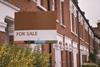 For sale sign terraced houses