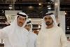 Shifting sands: Sheikh Mohammed bin Zayed Al Nahyan (right) surveys the design for Capital City