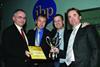 Winners (left to right): Press Gazette editor Ian Reeves presents PW’s Giles Barrie and James Whitmore with the IBP trophy