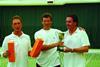 On the ball: Rokeagle’s Richard Stileman (left) and men’s doubles winners Chris Mitchell (middle) and John Randall (right)