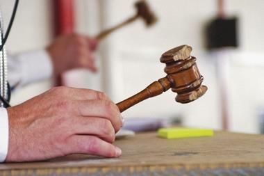 Auctioneers hand and gavel Auction