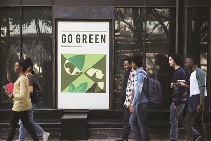 Students with Go Green poster shutterstock_620683097 Rawpixel