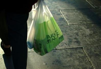 Man with M&S shopping bag