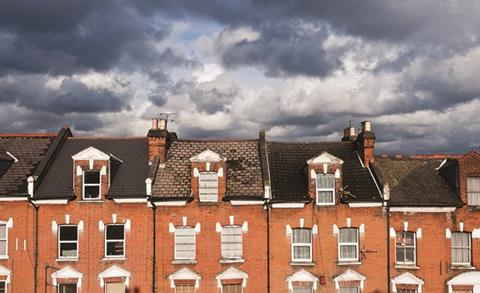 Dark clouds over houses